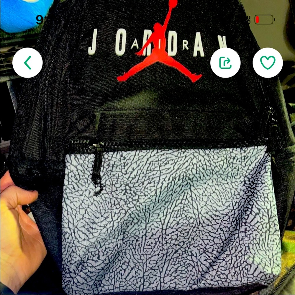 Brand new never carried Jordan bag and other things added